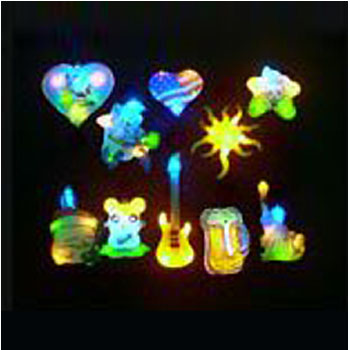 Light emitting badges, toys, handkerchief and horns